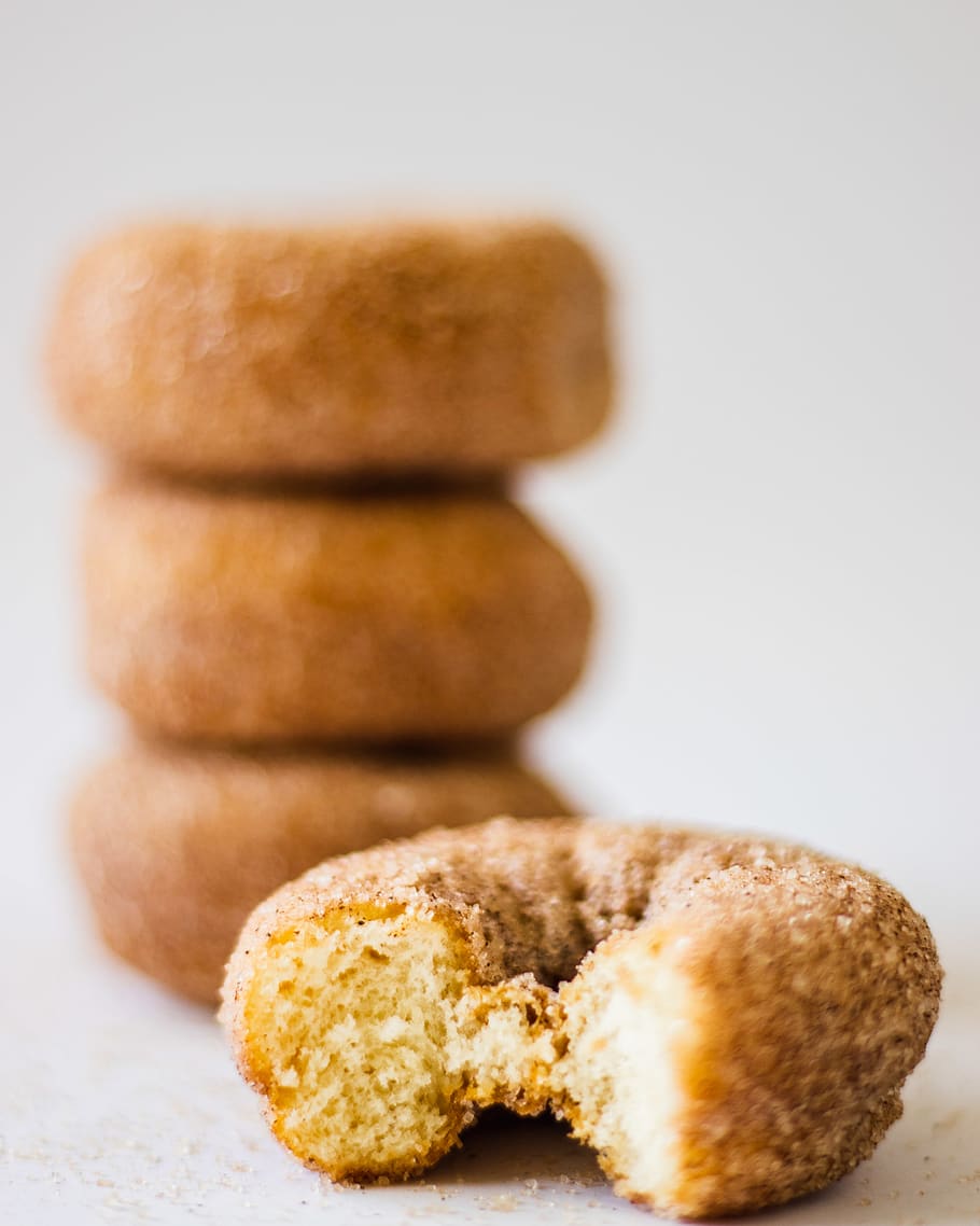 doughnut on white surface, bread, food, donut, dessert, pastry HD wallpaper