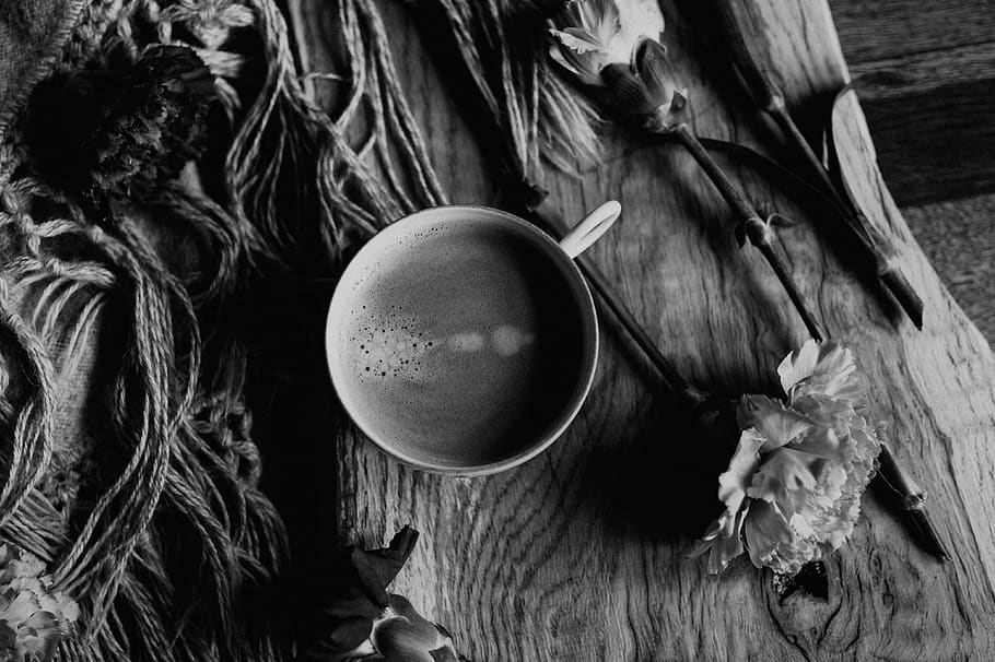 cup-of-coffee-on-wooden-table.jpg