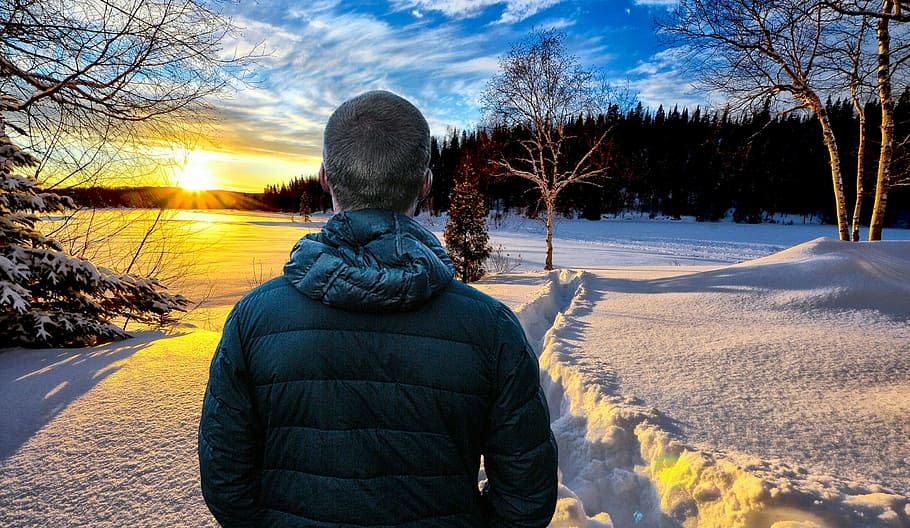 Photo illustration of man walking through snowy winter landscape during sunrise, HD wallpaper