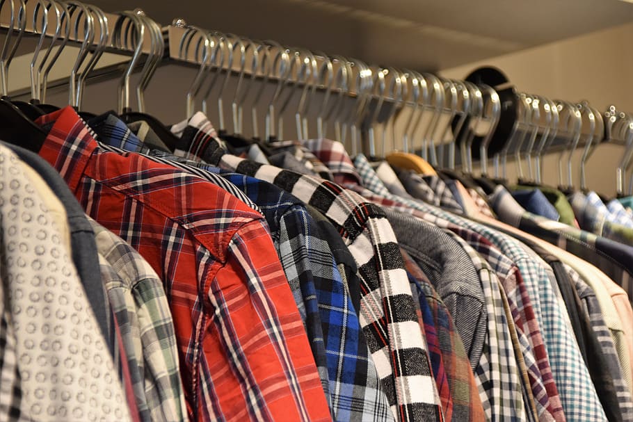 assorted-color hanged clothes, coathanger, retail, hanging, clothing HD wallpaper