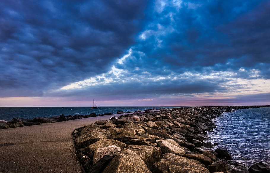 mole, sea, sunset, evening, ocean, stones, away, road, water HD wallpaper