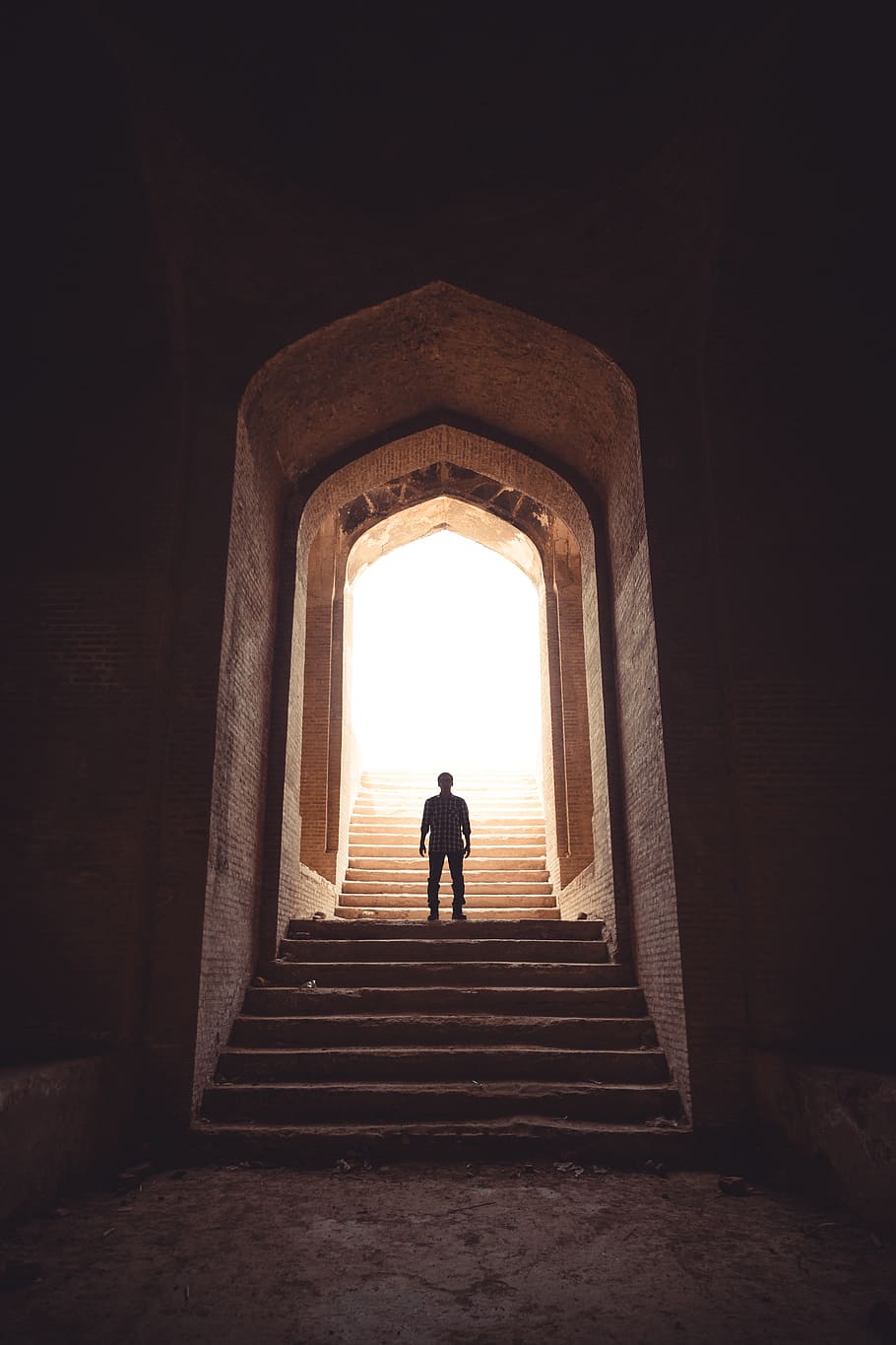 Man Standing Between Stairway on Pathway, arches, architecture HD wallpaper