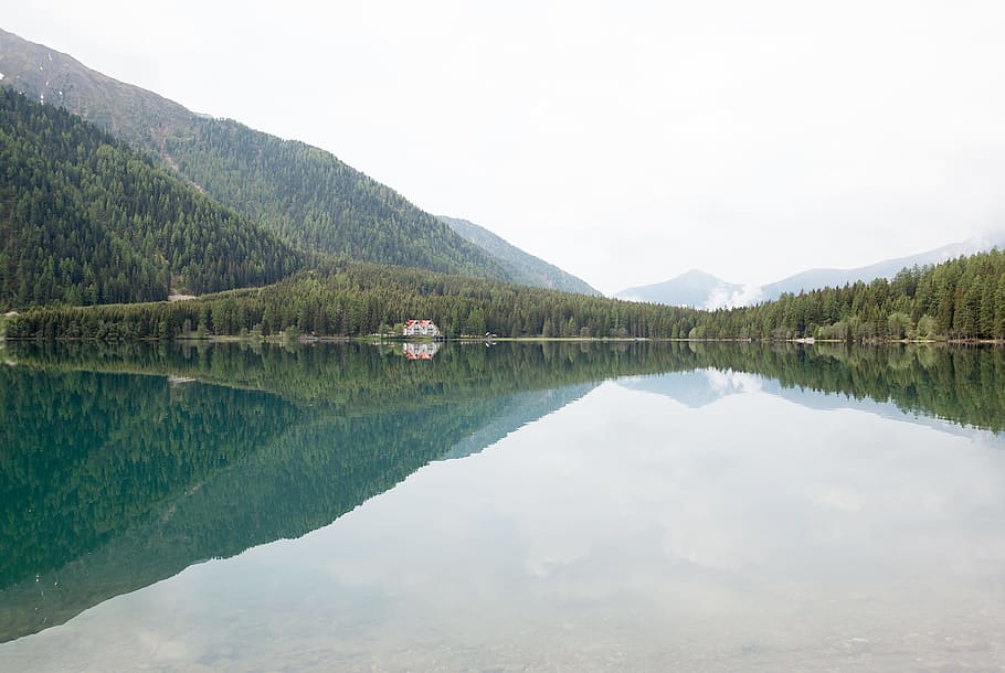 Photograph of Calm Body of Water and Mountain Ranges, clouds HD wallpaper