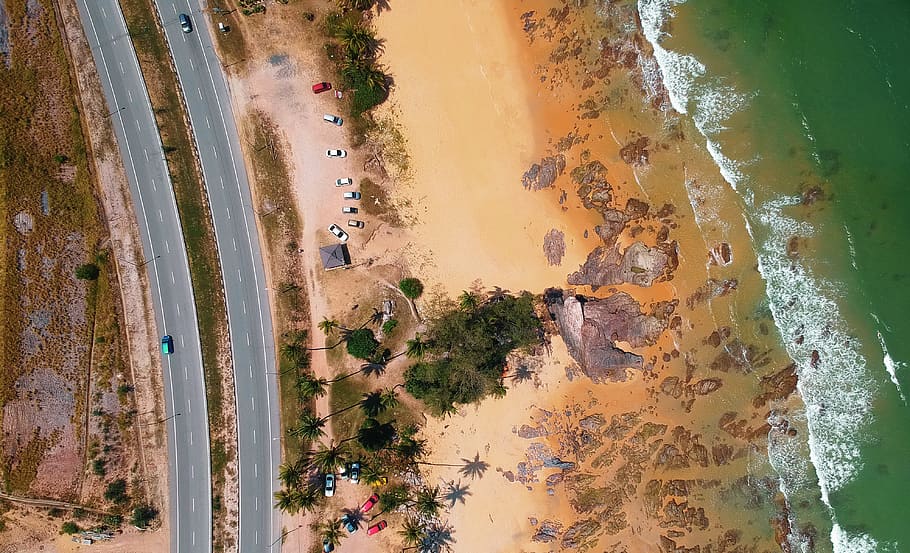 Aerial Photo of Seashore Near Two Lanes of Wide Road, beach, bird's eye view, HD wallpaper