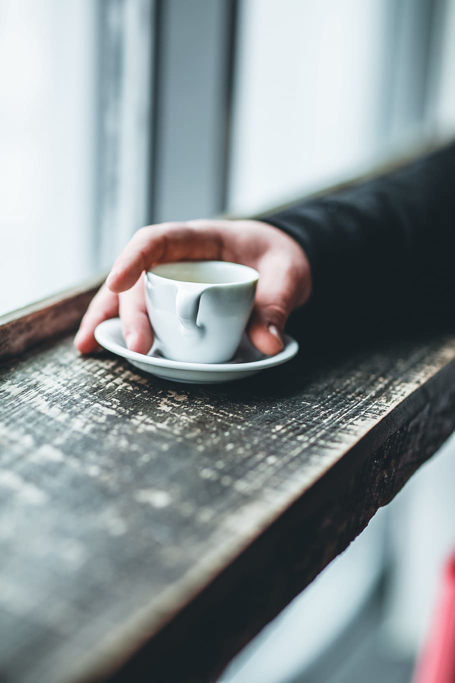 man, holding, espresso, coffee, cup, saucer, window, ledge