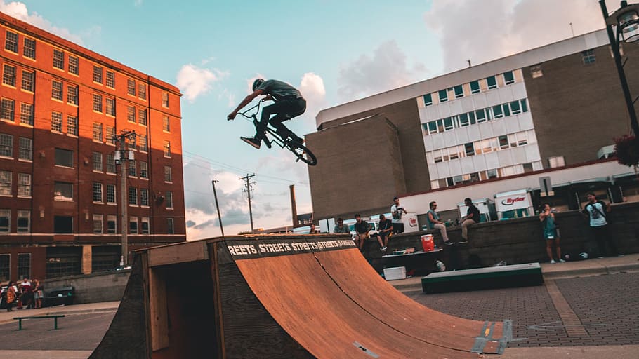 person doing bicycle tricks outside, architecture, skill, sport HD wallpaper