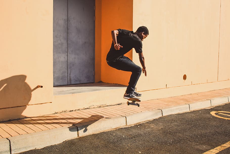 man doing tricks while riding on skateboard, one person, full length HD wallpaper