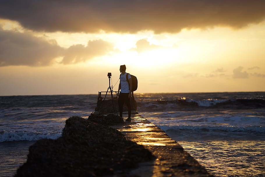 man carrying backpack standing on dock, person, human, photography HD wallpaper