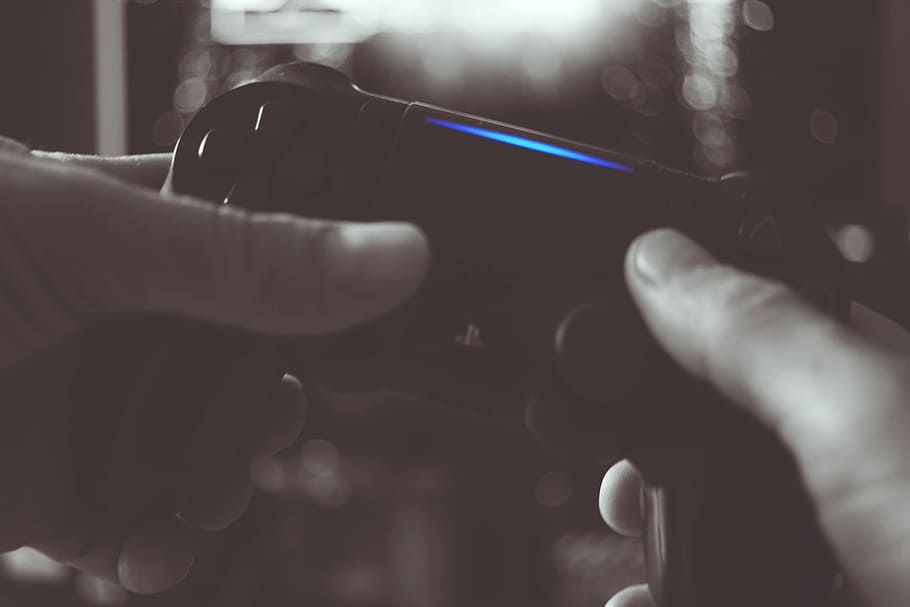 Black And White Photo Of Man Holding Sony Ps4 Wireless Controller HD wallpaper