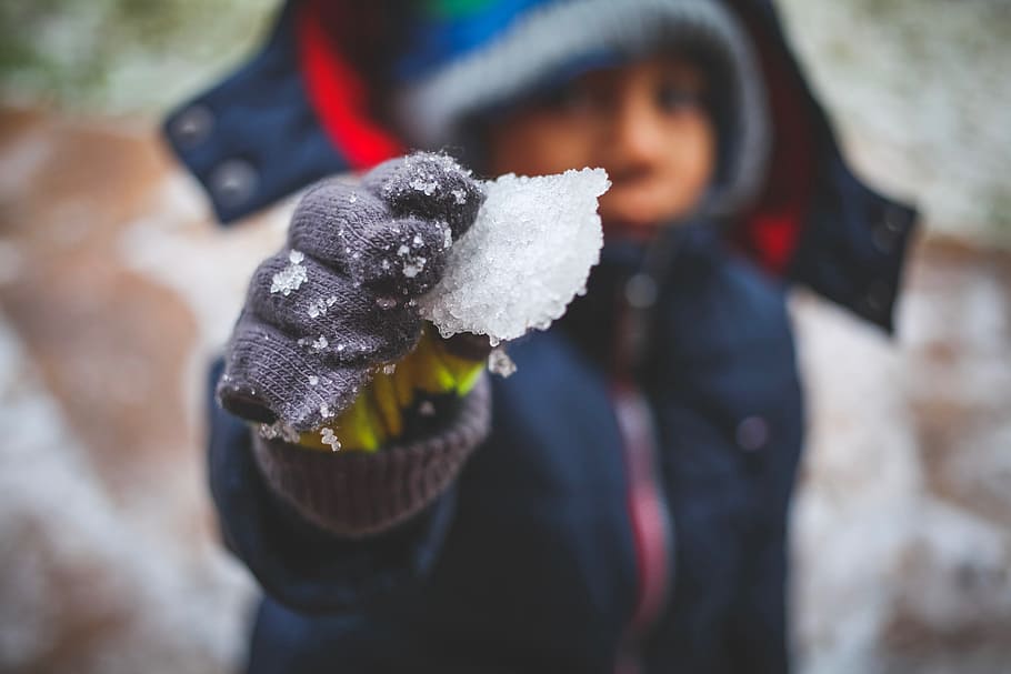 Person Holding Ice Shard, blur, child, cold, daylight, depth of field HD wallpaper