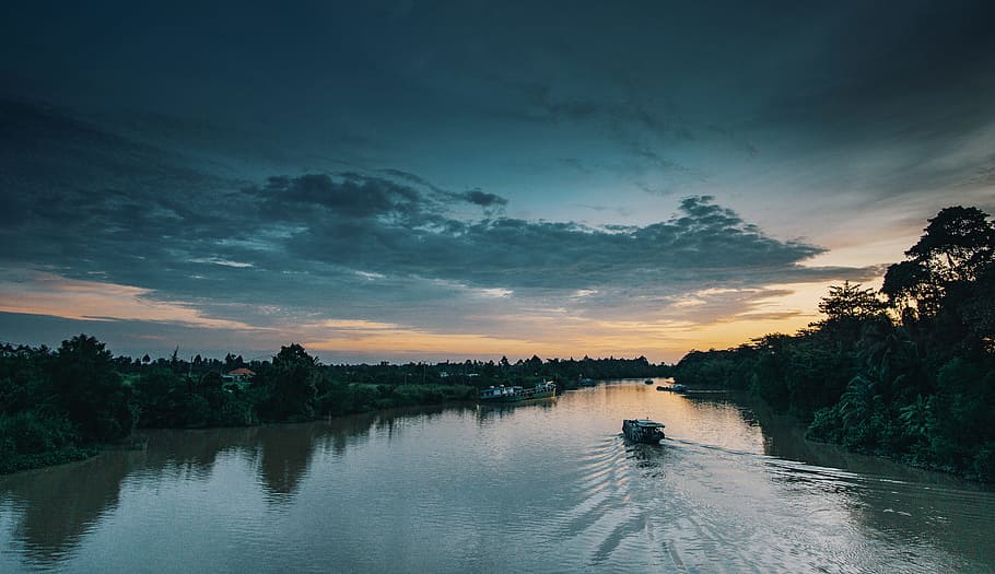 Boat on Lake Surrounded by Green Trees and Plants, clouds, dusk HD wallpaper