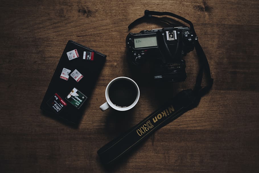 black Nikon D300, camera, electronics, coffee cup, cell phone, HD wallpaper
