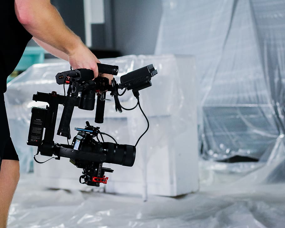 person holding black camera stabilizer, photography themes, occupation HD wallpaper