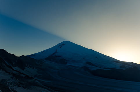 alps mountain, ridge, peak, shadow, blue, sunlight, ray, glow HD wallpaper
