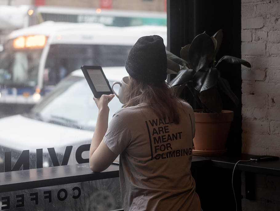 woman having coffee while using tablet, one person, rear view HD wallpaper