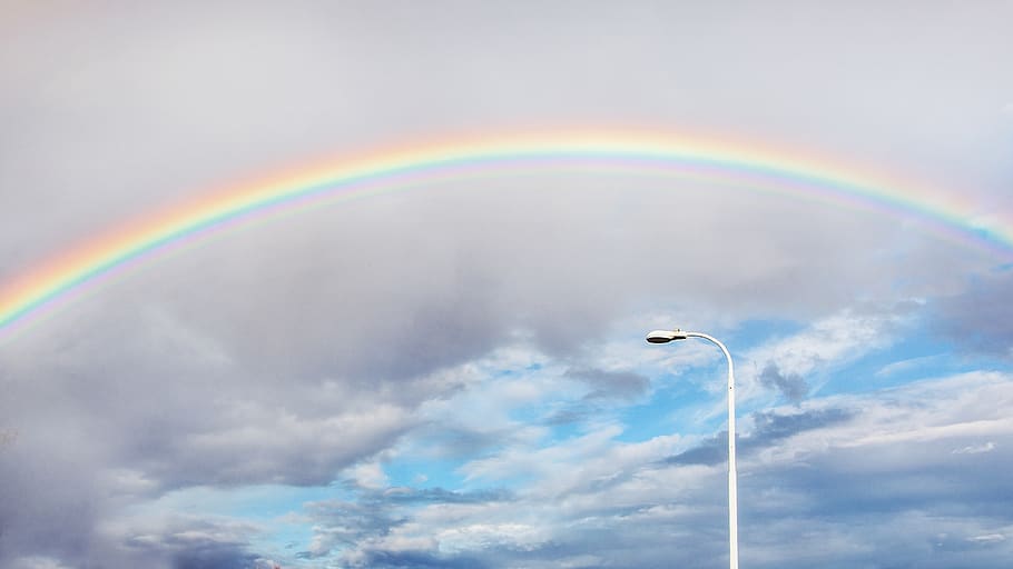 rainbow over white streetlight, cloud - sky, beauty in nature HD wallpaper