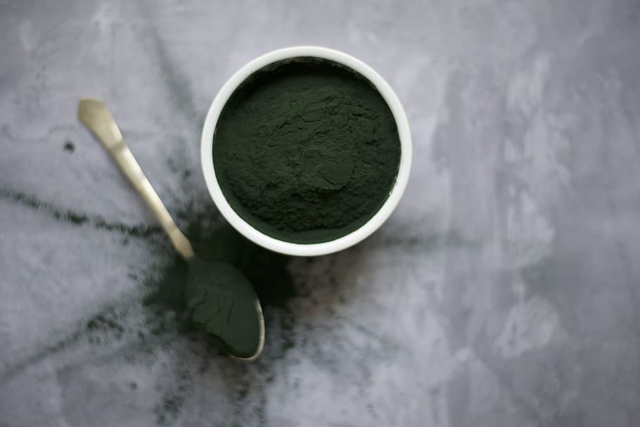 flat lay photography of green powder in pot, food and drink, tea