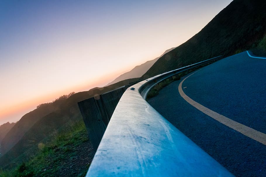 winding, road, corner, railing, mountains, sky, sunset, dusk HD wallpaper