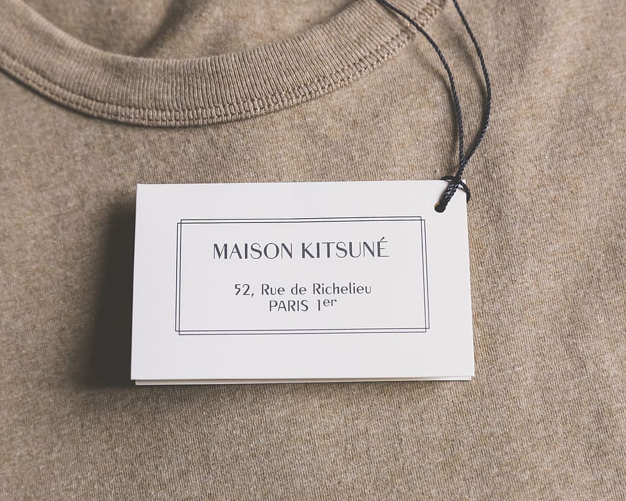 Maison Kitsune product label, clothing, apparel, text, paper