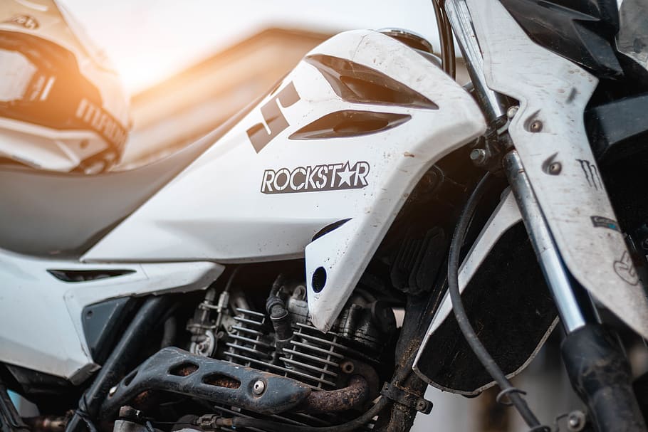 white Rockstar sports bike, vehicle, motorcycle, machine, transportation