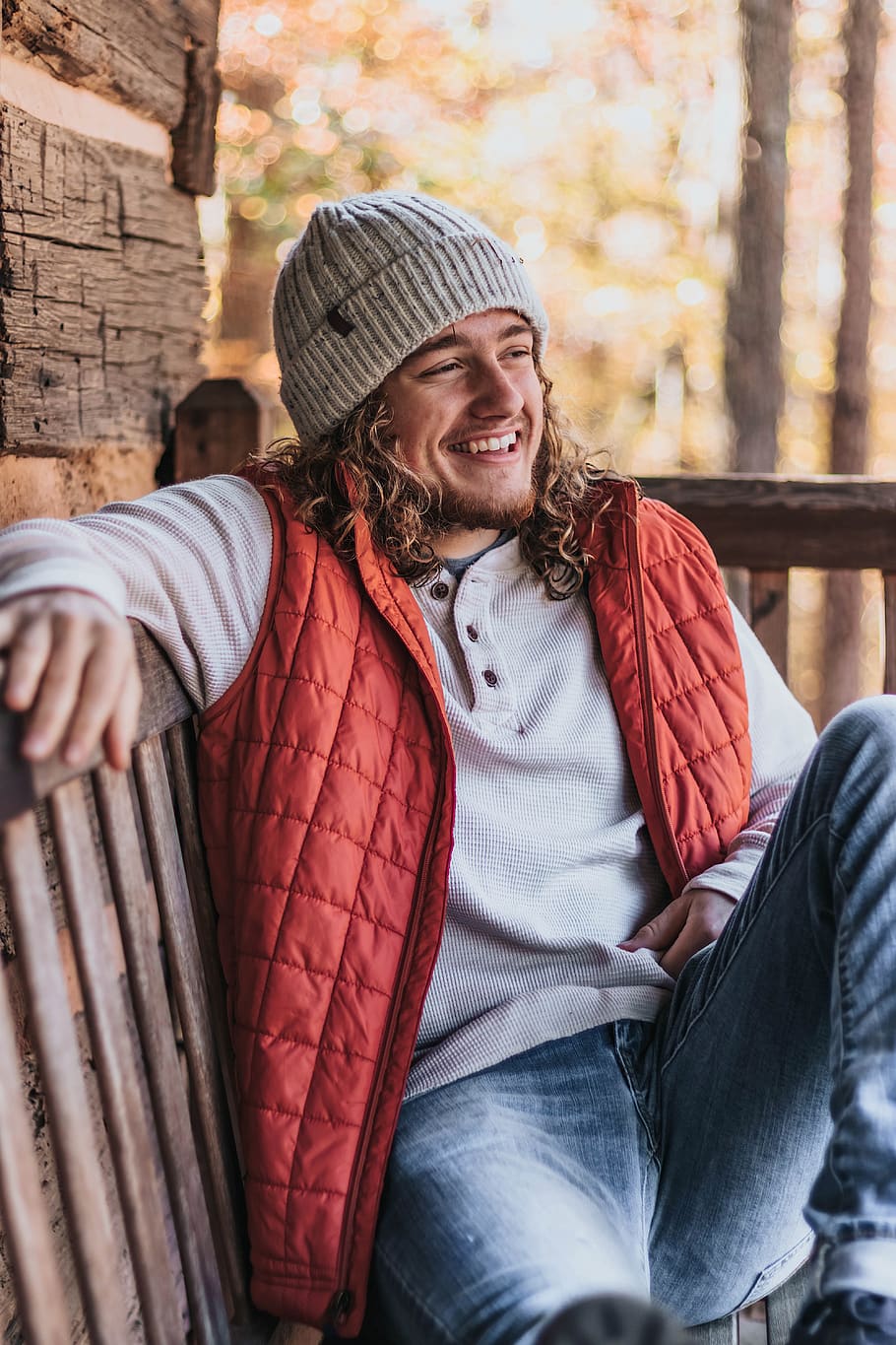 smiling man while sitting on brown chair, clothing, apparel, human HD wallpaper