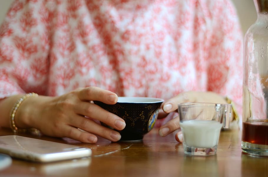 Woman Holding Black Cup, beverage, bottle, breakfast, close-up HD wallpaper