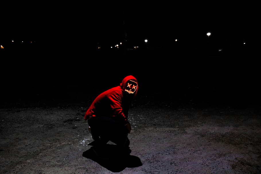 man wearing red hoodie squating on pavement, person, human, people, HD wallpaper