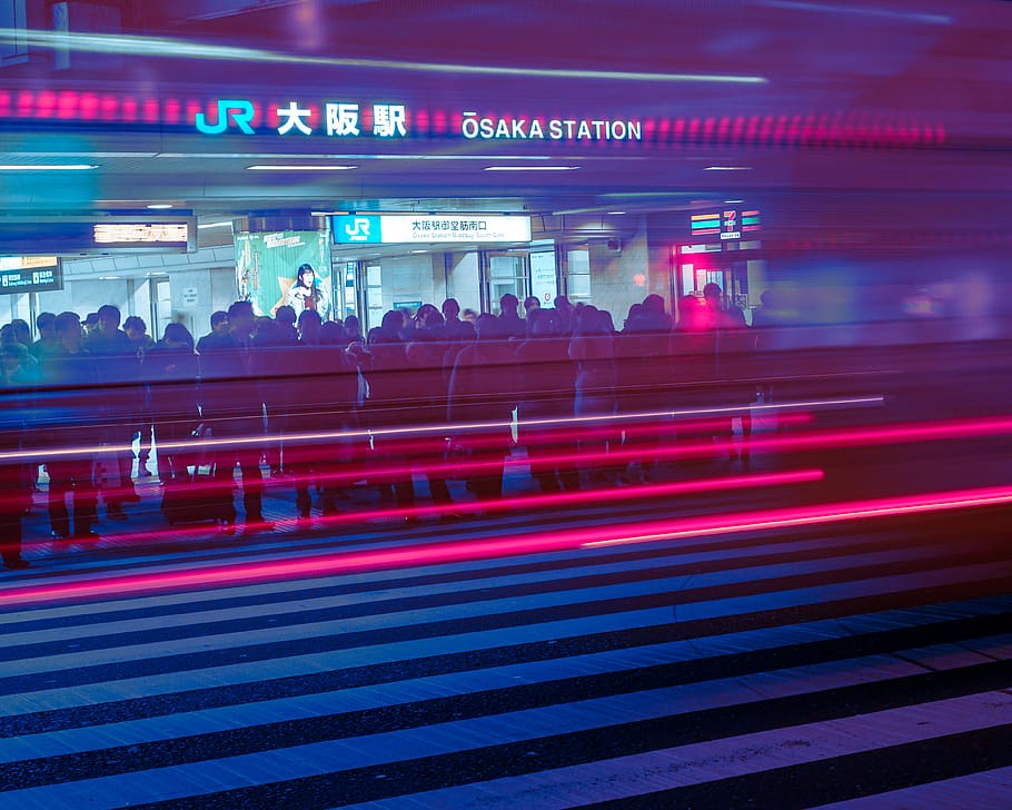 time lapse photography of people in subway, osaka, osaka station