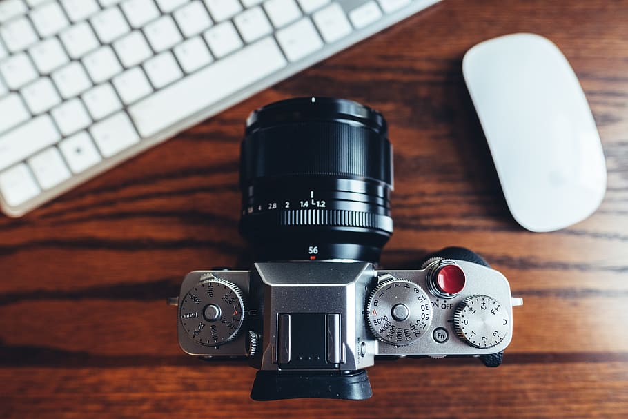 black and gray DSLR camera, technology, table, photography themes HD wallpaper