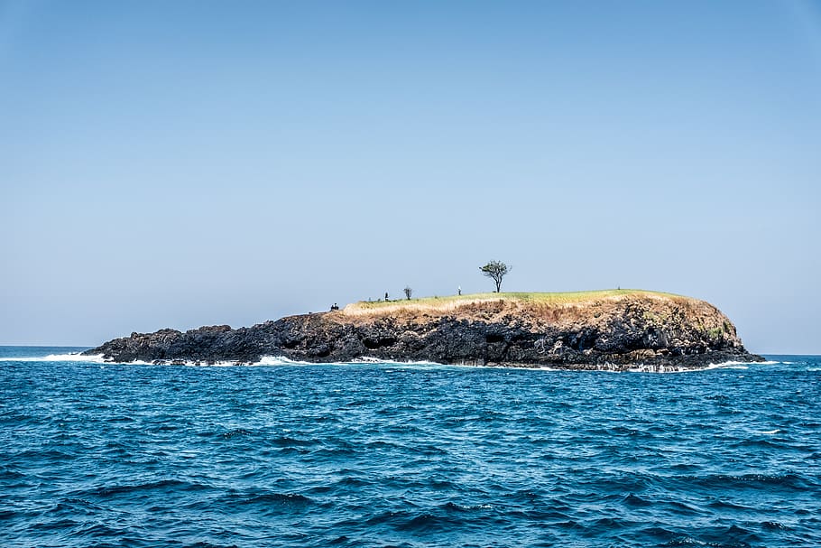indonesia, padangbai, stone, alone, nature, ocean, island, grass HD wallpaper