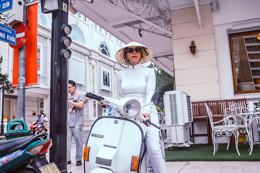 Woman Sitting on Motor Scooter, architecture, beautiful, beauty HD wallpaper