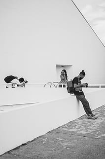 Grayscale Photo of Man Using Camera, black and white, building HD wallpaper