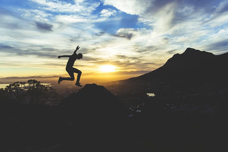 sunset, silhouette, jumping, guy, man, people, landscape, mountains HD wallpaper