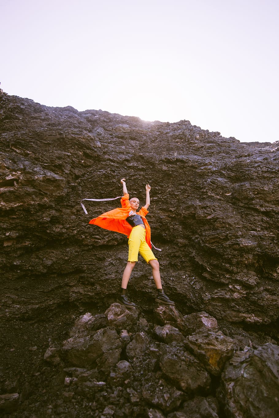 Person Wearing Orange Jacket, action, adventure, cliff, daylight HD wallpaper