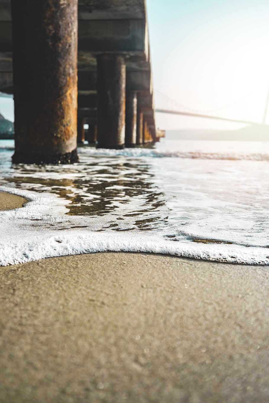Closeup Photo of Seashore Near Bridge, beach, coast, columns HD wallpaper