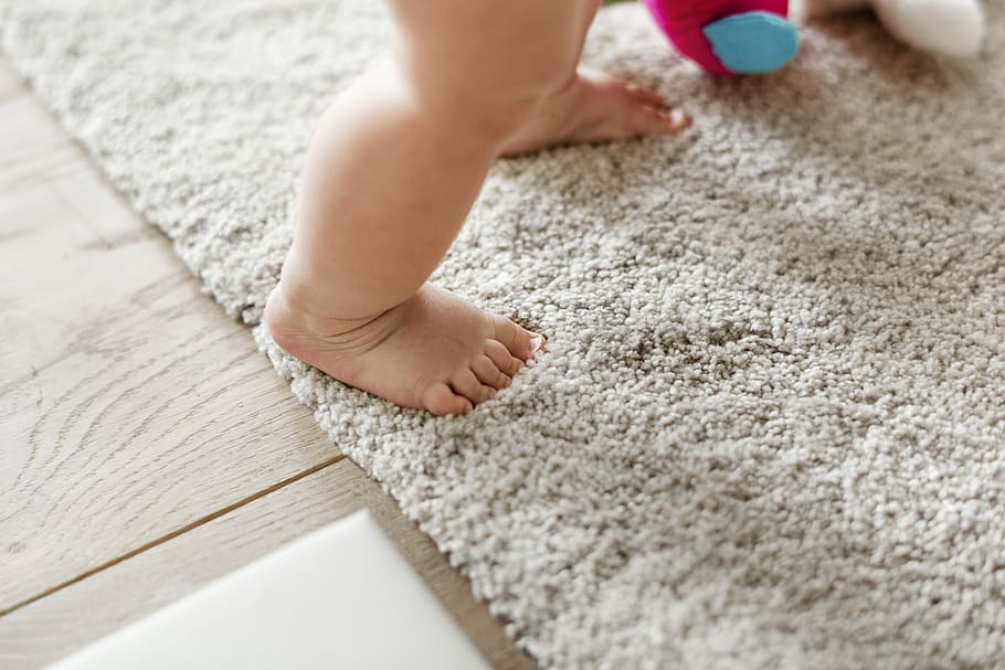 Baby's Standing on Gray Floor Rug, active, adorable, baby feet