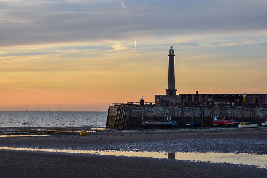 sunset, beach, lighthouse, sea, sky, twilight, water, evening HD wallpaper
