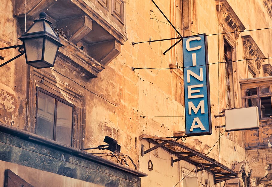 Buildings and Signboard with word CINEMA in Valletta, Malta, advertising HD wallpaper