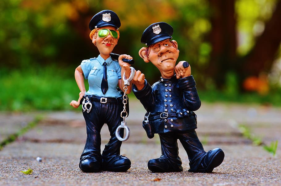 Police Man and Police Woman Plastic Toy on Fllow, batons, cops HD wallpaper