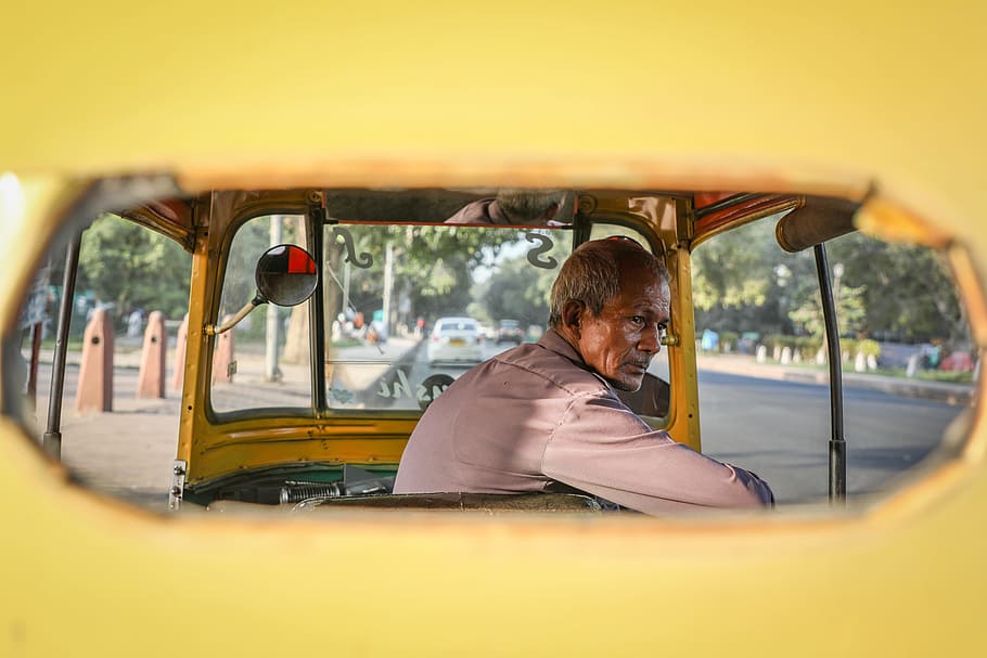 man in a yellow tricycle, car, male, elderly, old man, indian man