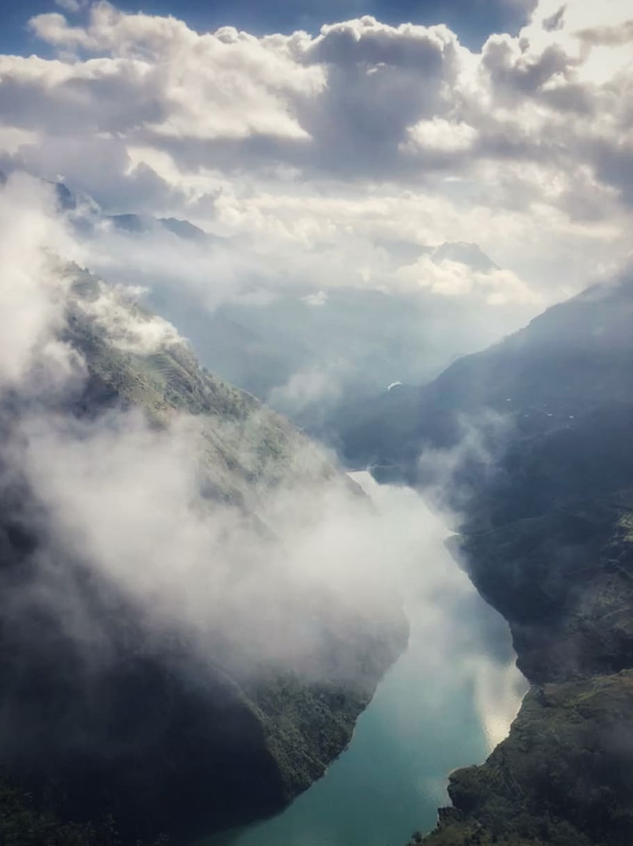 river beside mountains under grey clouds, beauty in nature, scenics - nature HD wallpaper