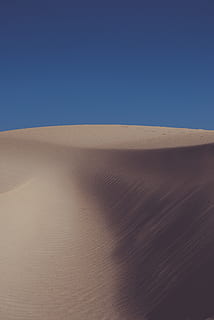 empty desert under blue sky during daytime, soil, sand, outdoors HD wallpaper