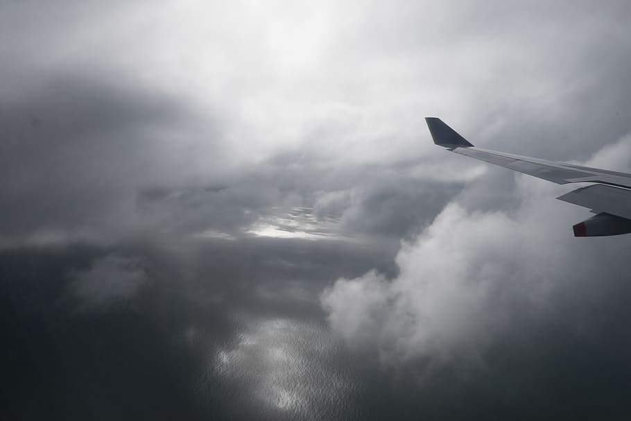 flight, wing, ocean, clouds, water, sky, planet, altitude, cloud - sky HD wallpaper