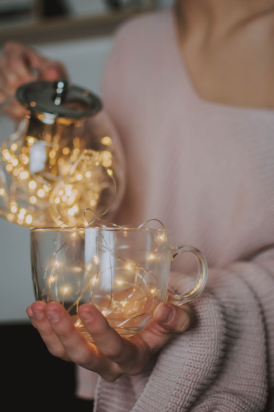 yellow string light, holding, one person, human hand, human body part HD wallpaper