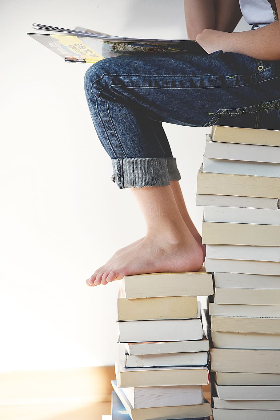 still, items, things, books, stack, pile, read, man, person HD wallpaper