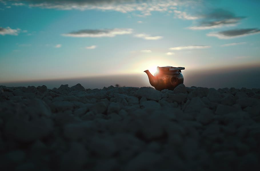 black kettle on rocks, sky, sunset, cloud - sky, nature, one person HD wallpaper