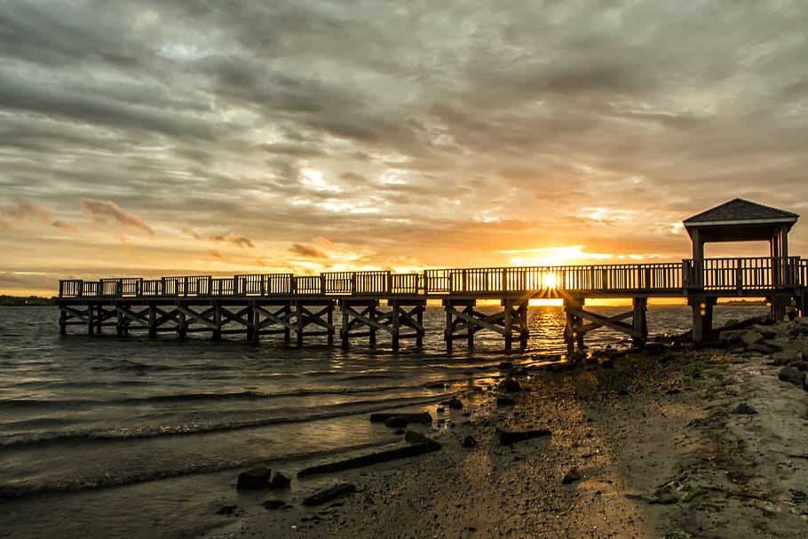 brown bridge, sky, sunset, water, sea, cloud - sky, beach, land HD wallpaper