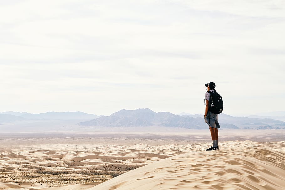 desert, landscape, highland, mountain, view, sky, people, man HD wallpaper