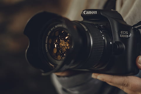 black Canon EOS 1300D DSLR camera, bokeh, cold, winter, holding HD wallpaper