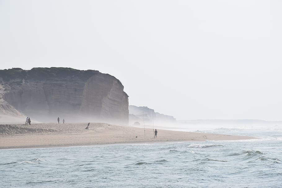 person standing on seashore during daytime, ocean, portugal, water HD wallpaper